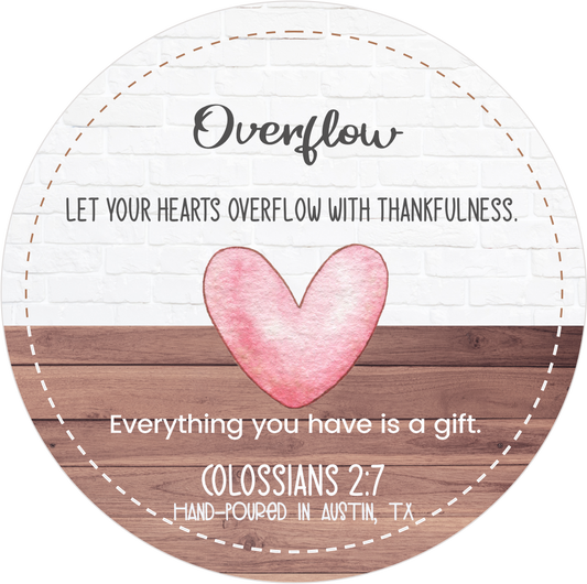 luxury soy candle featuring Colossians 2:7 Bible verse
