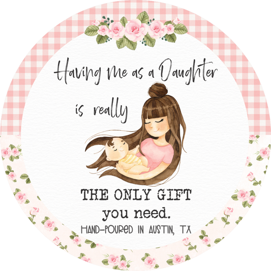 Illustration of a mother holding a baby with text 'Having me as a daughter is really the only gift you need.' surrounded by flowers and a checkered border.