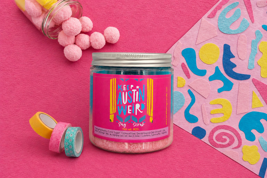 Jar of pink sugar scrub with colorful packaging on a pink background, MADE IN AUSTIN, ORGANIC SUGAR SCRUB, SUMMER SCENT