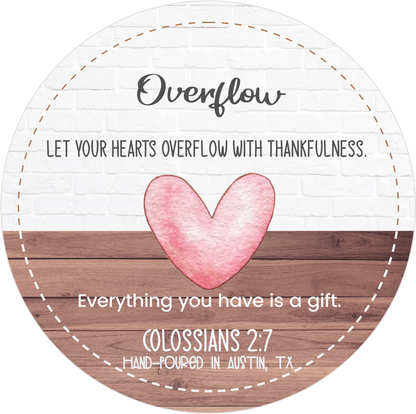 luxury soy candle featuring Colossians 2:7 Bible verse