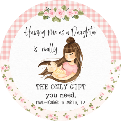 Illustration of a mother holding a baby with text 'Having me as a daughter is really the only gift you need.' surrounded by flowers and a checkered border.